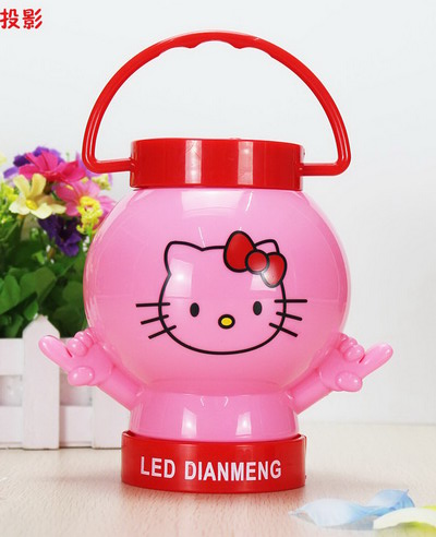 新款益智KT猫灯笼储钱罐带七彩灯光、投影动感音乐小苹果批发